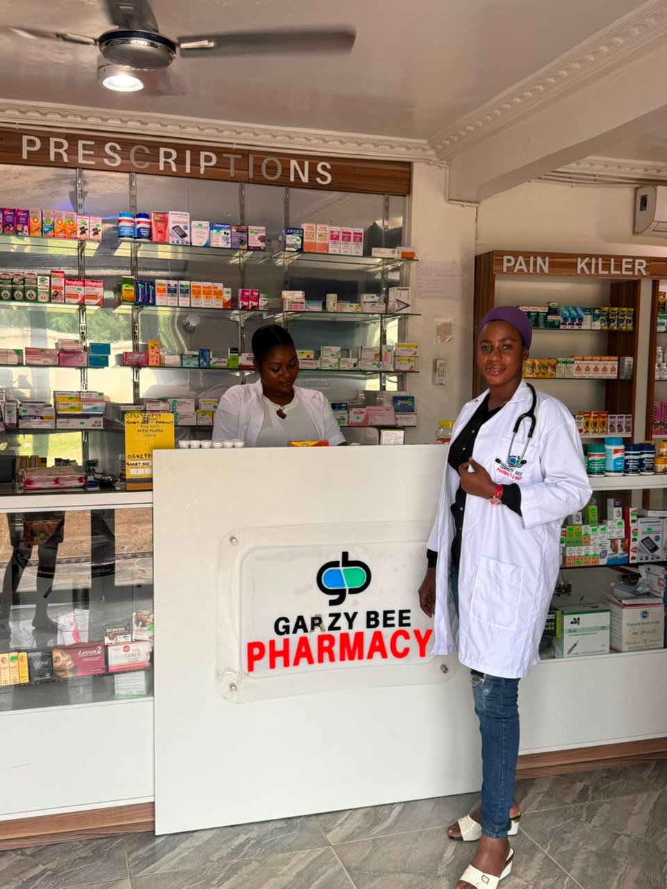 Garzy Bee Pharmacy interior and pharmacy staff